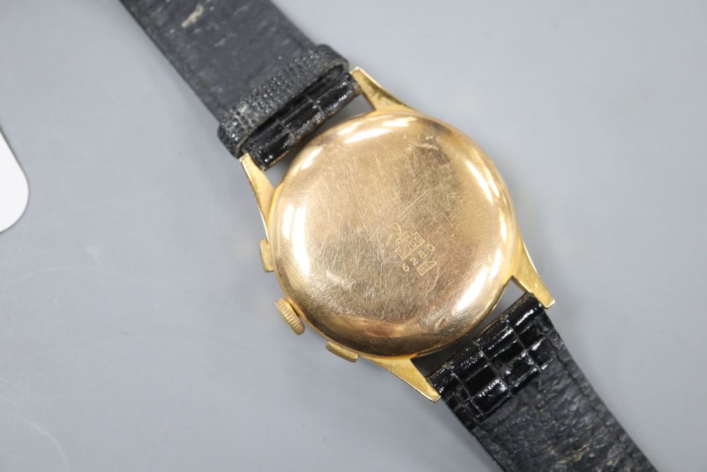 A gentlemans 1960s? 18k Coresa chronograph manual wind wrist watch, on later strap.